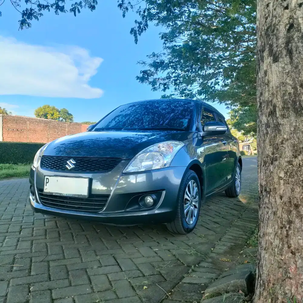 Suzuki Swift GX Km Low 2013