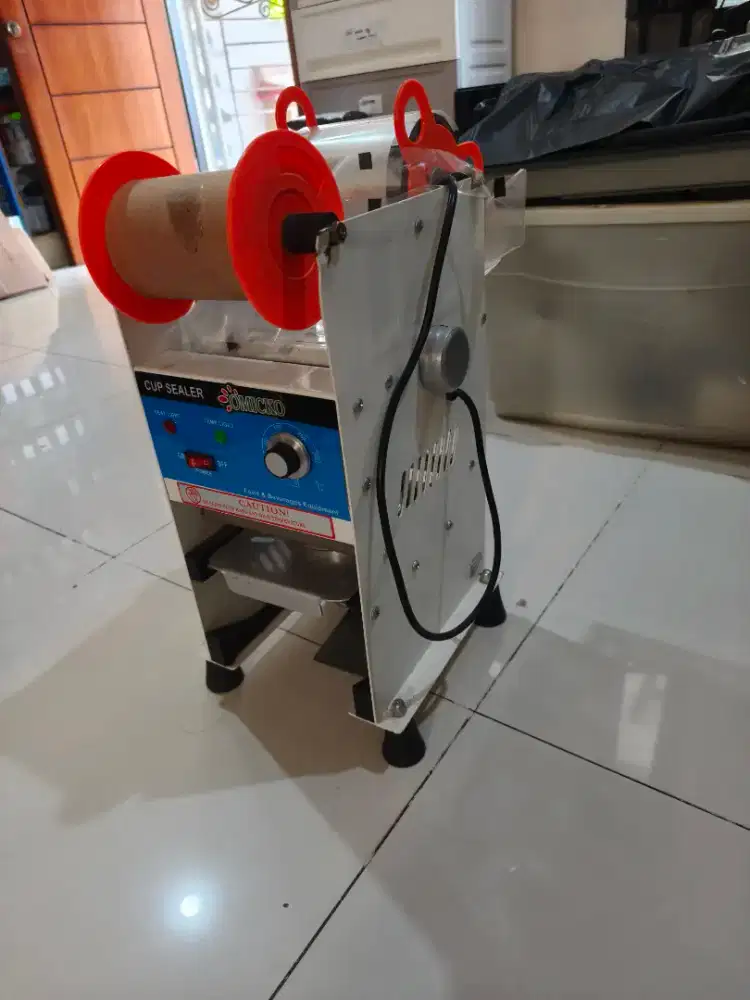 Cup sealer omicko layak pakai