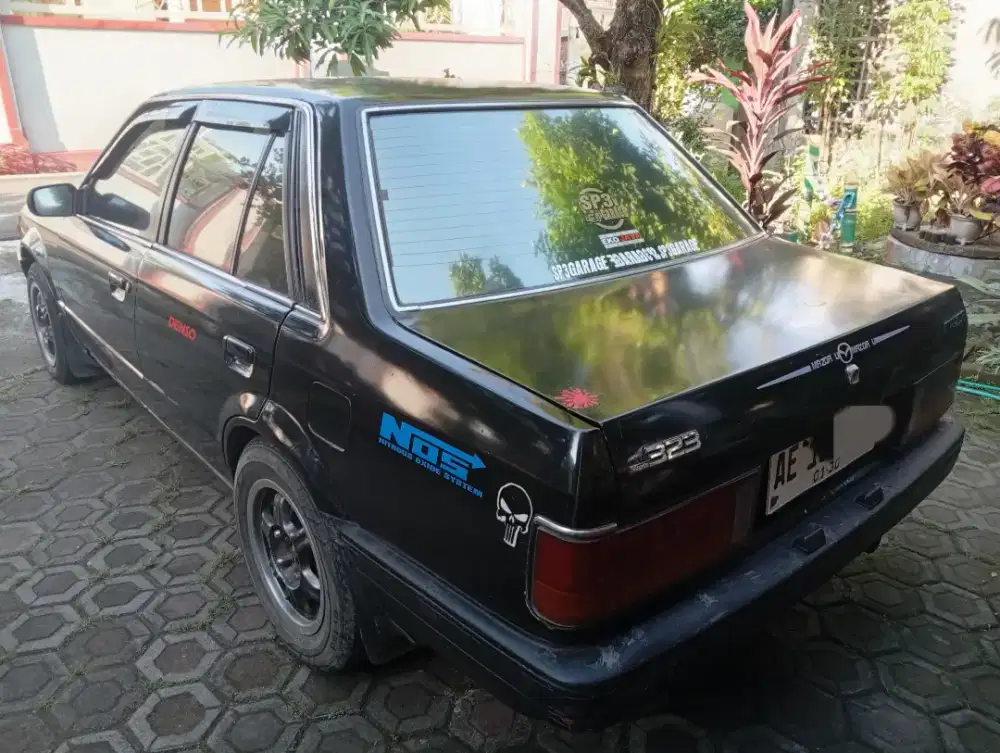 Diskon sedan mazda 323 12jtan