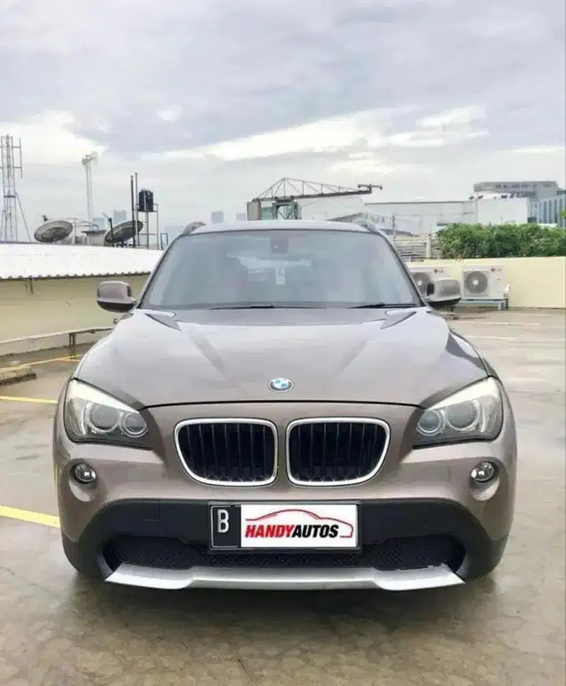 BMW X1 Executive Tahun 2011 Automatic Coklat Metalik