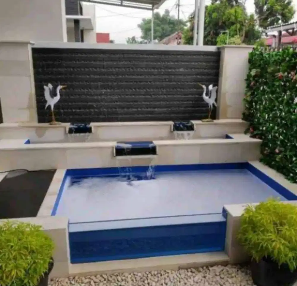 Kolam minimalis batu andesit