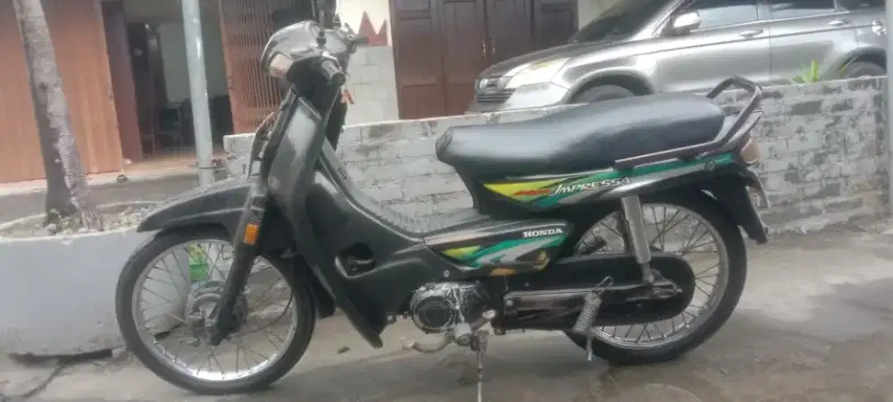 Astrea grand impressa THN 1998 plat AB kota