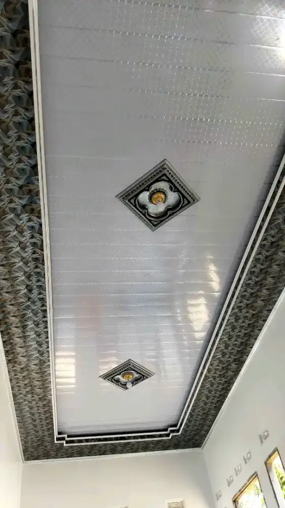 Pemasangan plafon PVC WPC