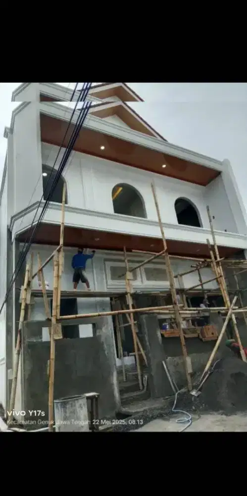 Tukang bagunan dan pelaksana pembagunan