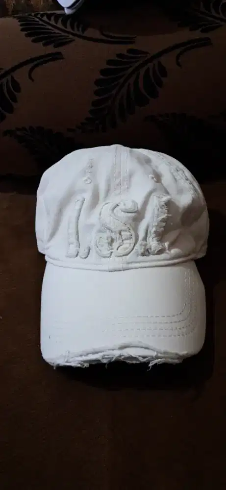 Topi ori putih masih bagus