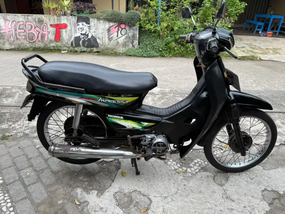 Astrea grand impressa THN 1998 plat AB kota