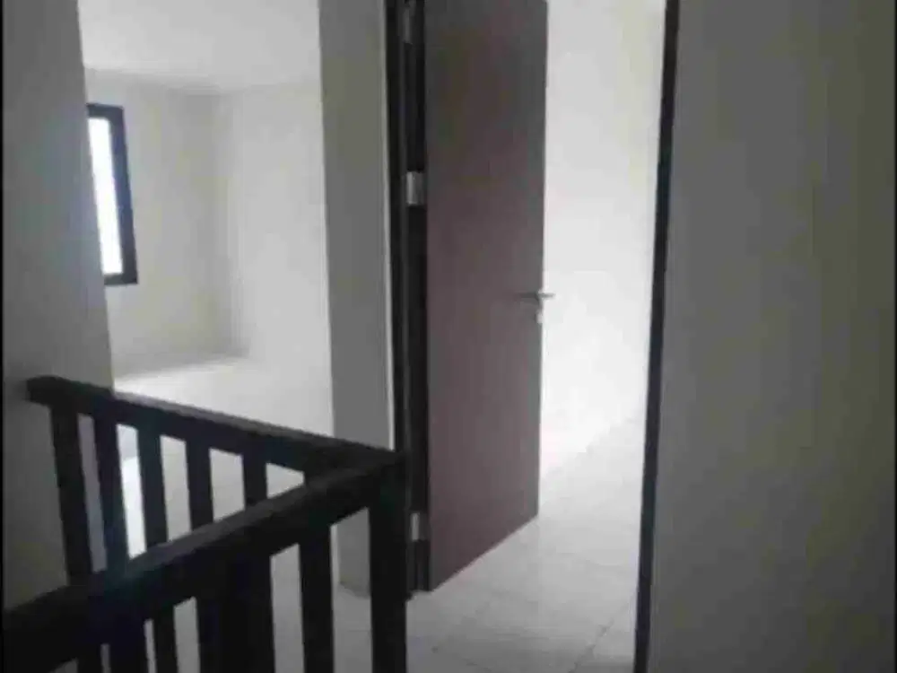 Rumah Dayana KT 3 semi furnish dengan  halaman belakangnya yang luas