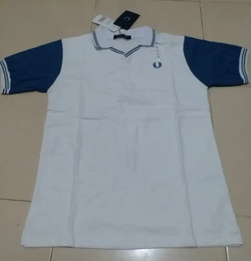 Kaos kerah Fred Perry original size L (LD 110) Baru fulltag