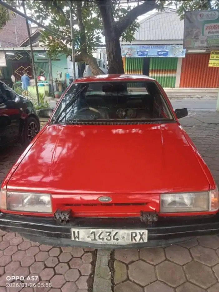 DIJUAL: Ford Laser 1995 – Siap Pakai!
