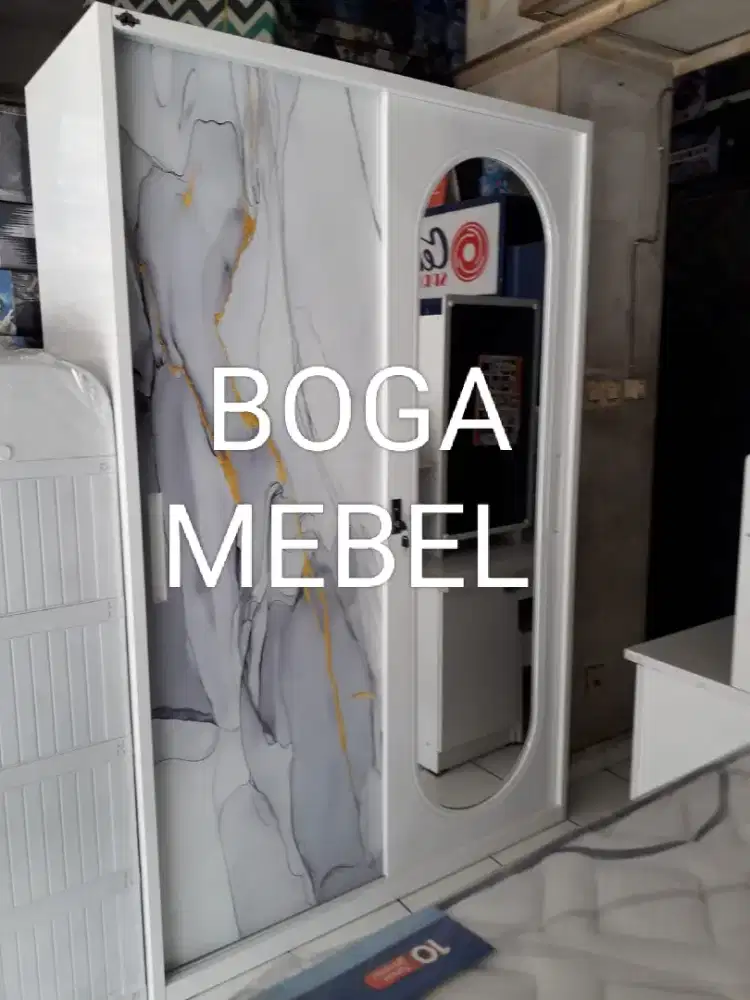 Lemari besi gantungan baju 2 pintu sliding