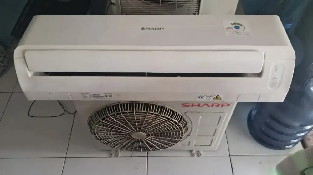 Ac 1/2pk sharp loww watt plus pasang