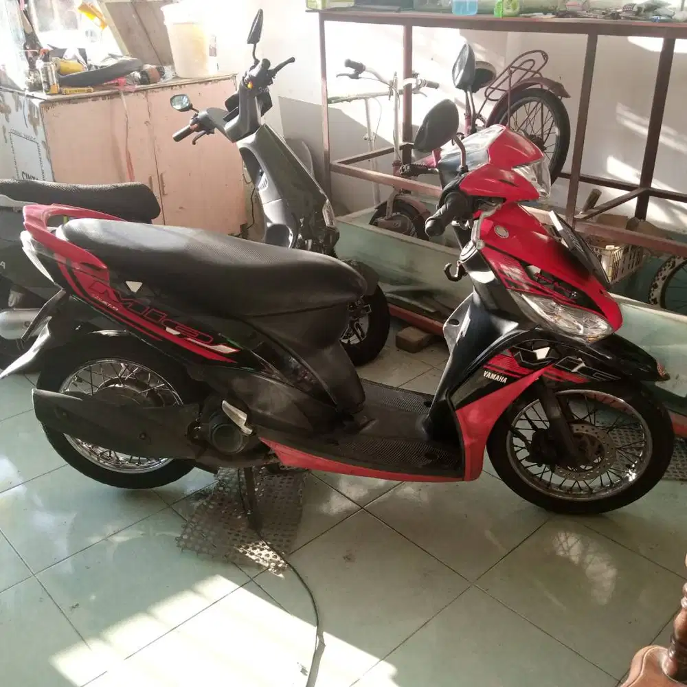 MIO J Merah 2014
