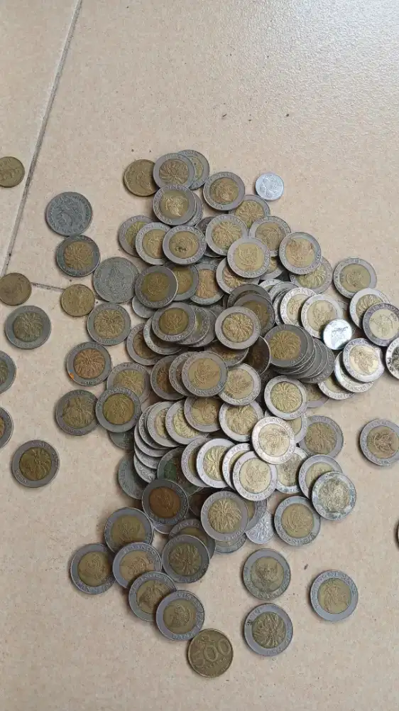 Koin seribu rupiah kelapa sawit