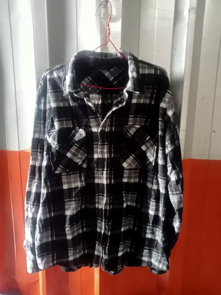 Kemeja flanel bahan lembut.dingin