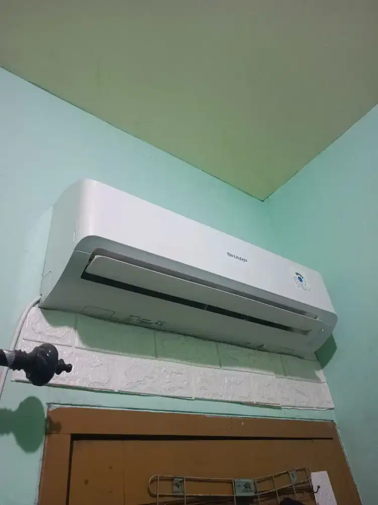 Ac SHARP ½ PK baik dan normal