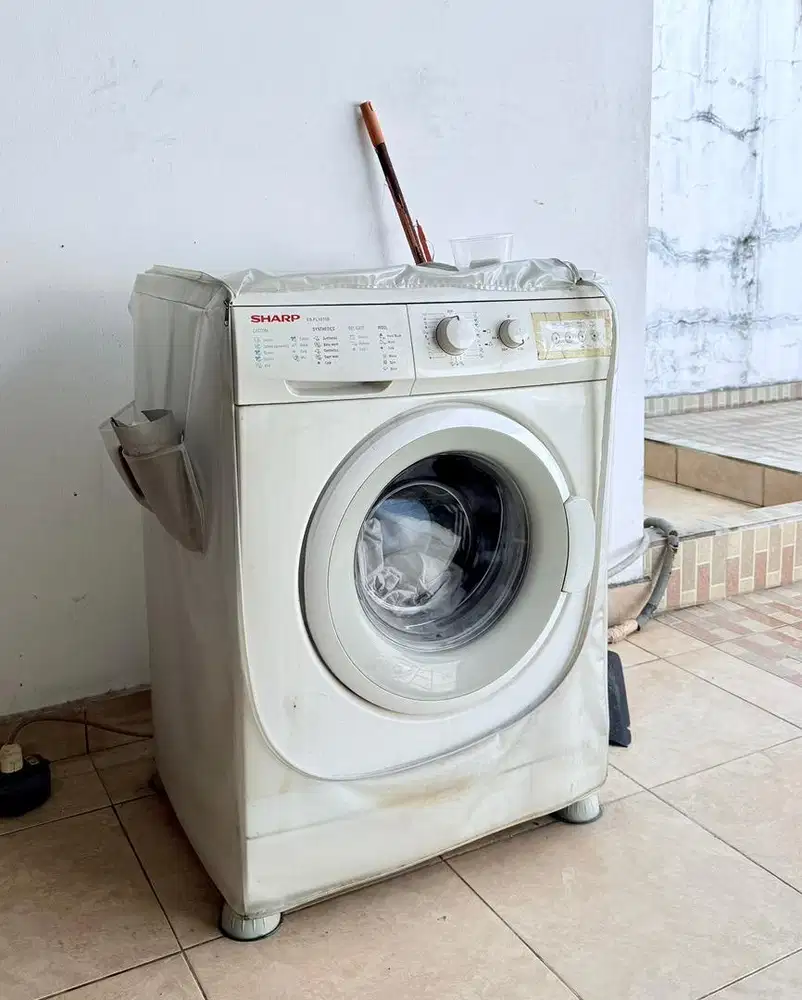 Mesin cuci front loading sharp