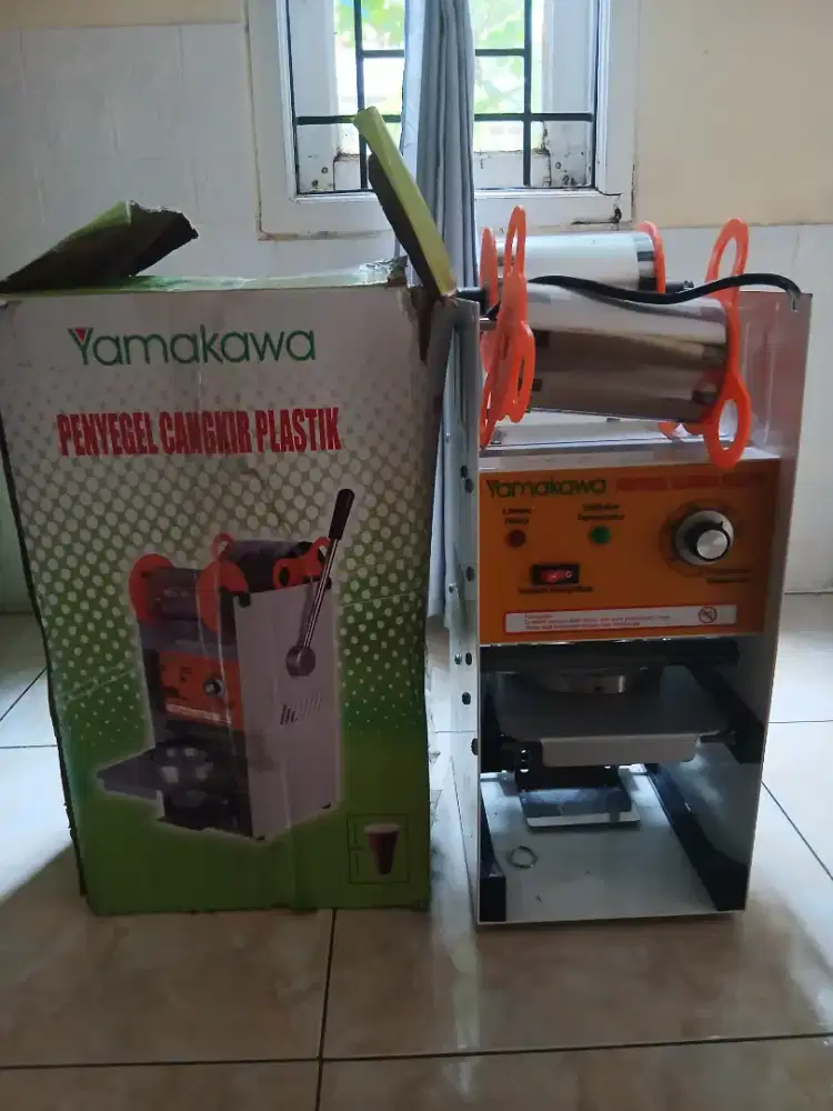 Penyegelan cangkir plastik