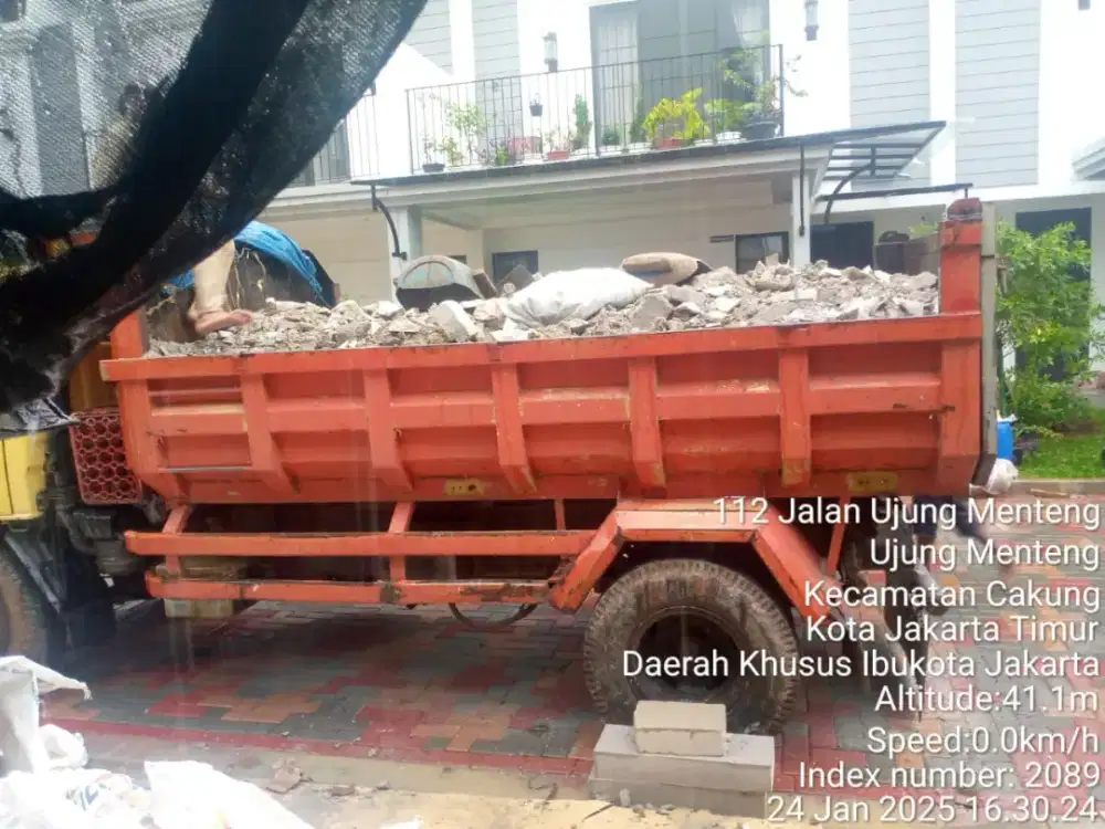 Pengurukan tanah campur puing Murni