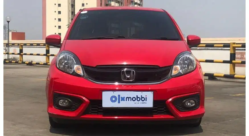 TDP 7,JT, Honda Brio Satya 1.2 E Bensin-AT Merah 2017
