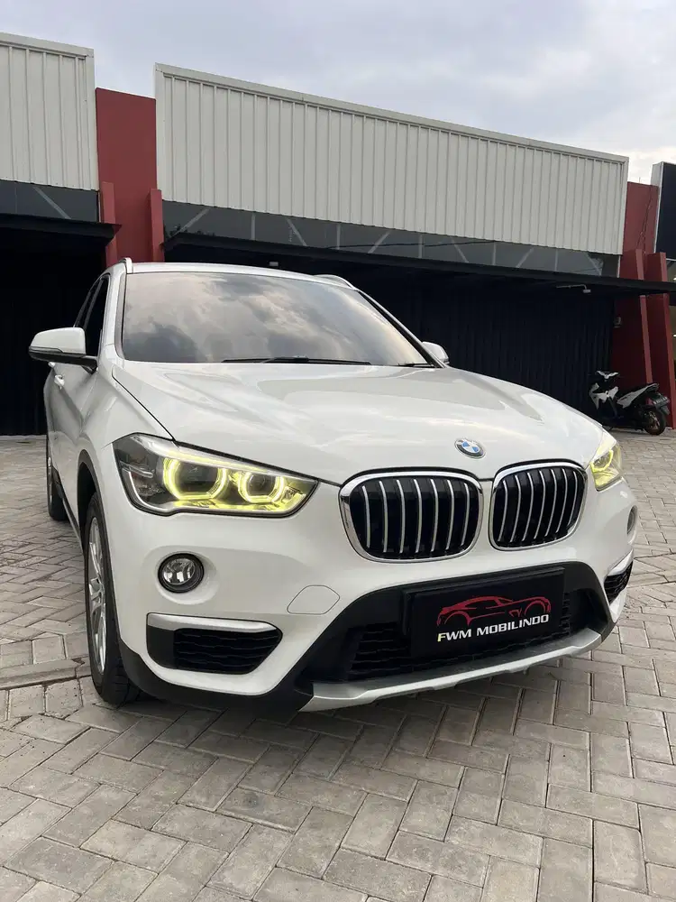 Bmw x1 sdrive xline AT bensin 2018 putih, istimewa