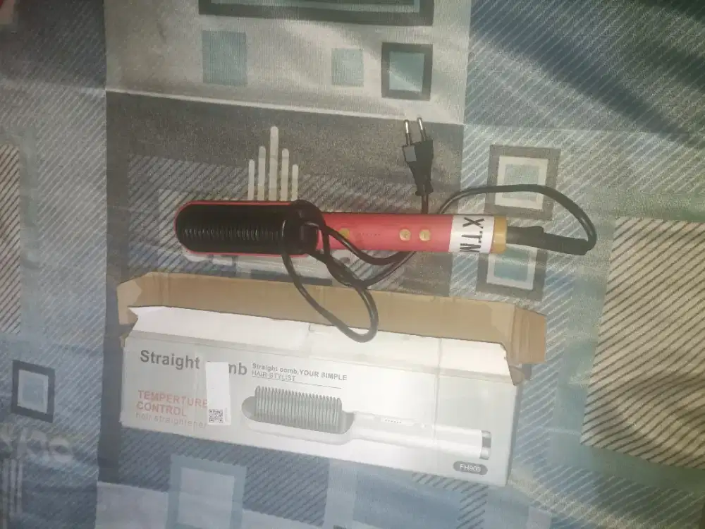 Catokan rambut sisir