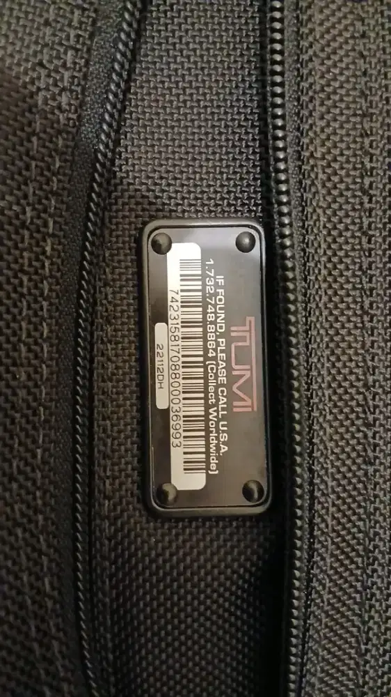 Tas serempang kantor TUMI