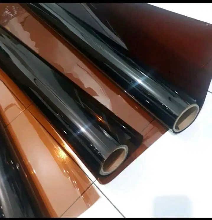 Kaca film coklat dan clear/bening barang tutup toko