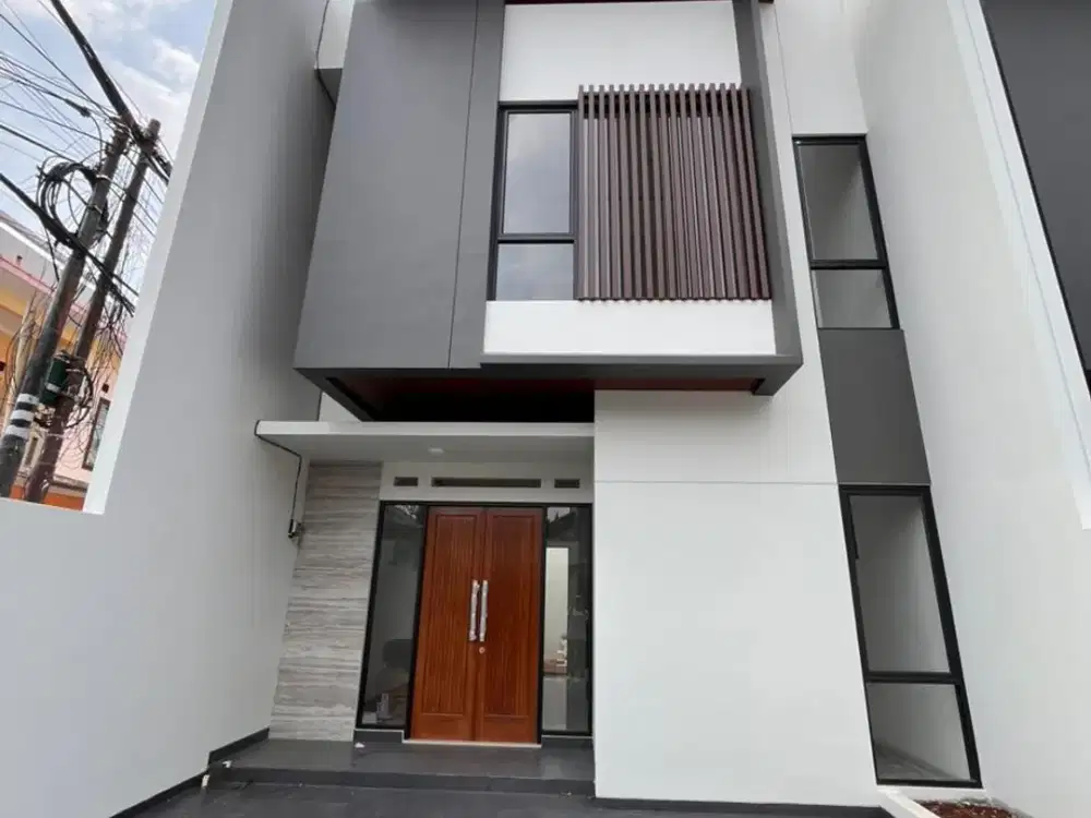 DIJUAL RUMAH SIAP HUNI BEKASI BEBAS BANJIR DEKAT TOL SHM 2 LANTAI MODERN