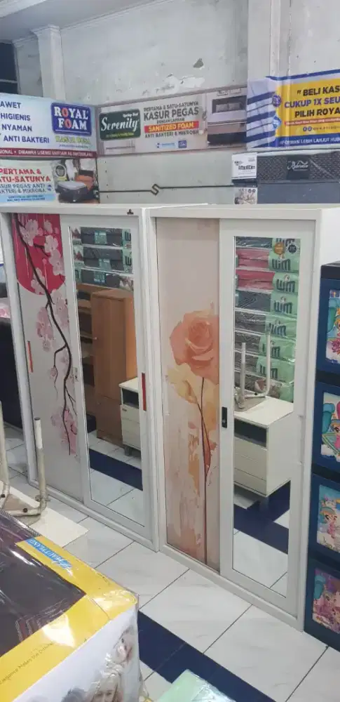 Lemari besi pintu geser 120x50x185 motif Madiun kota