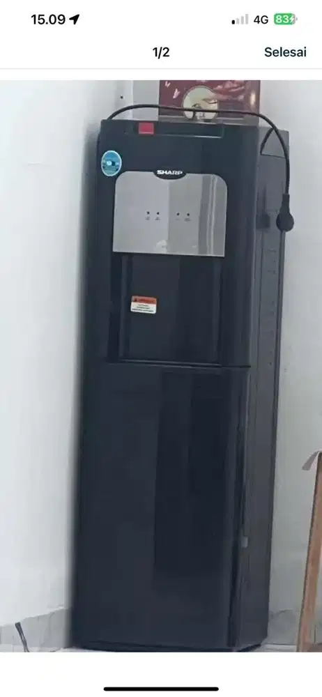 Dispenser sharp panas dingin