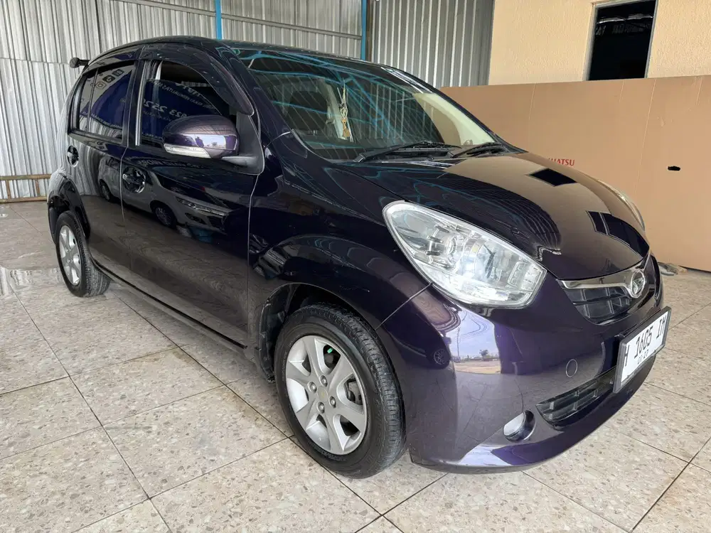 DAIHATSU SIRION RS AT 2013 UNGU BURGUNDY