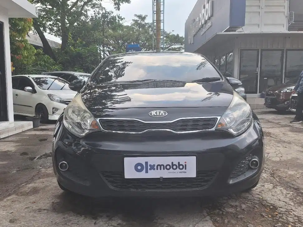 DP MURAH KIA Rio 1.4 Bensin-AT 2014 Hitam C2PPD