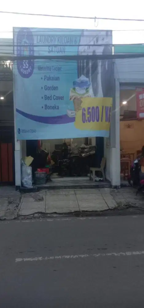 TUKANG SETRIKA LAUNDRY