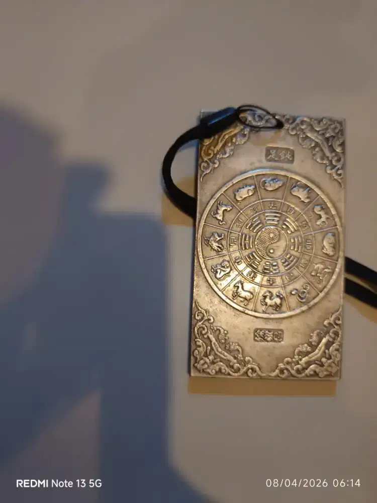 pahatan  tangan shio