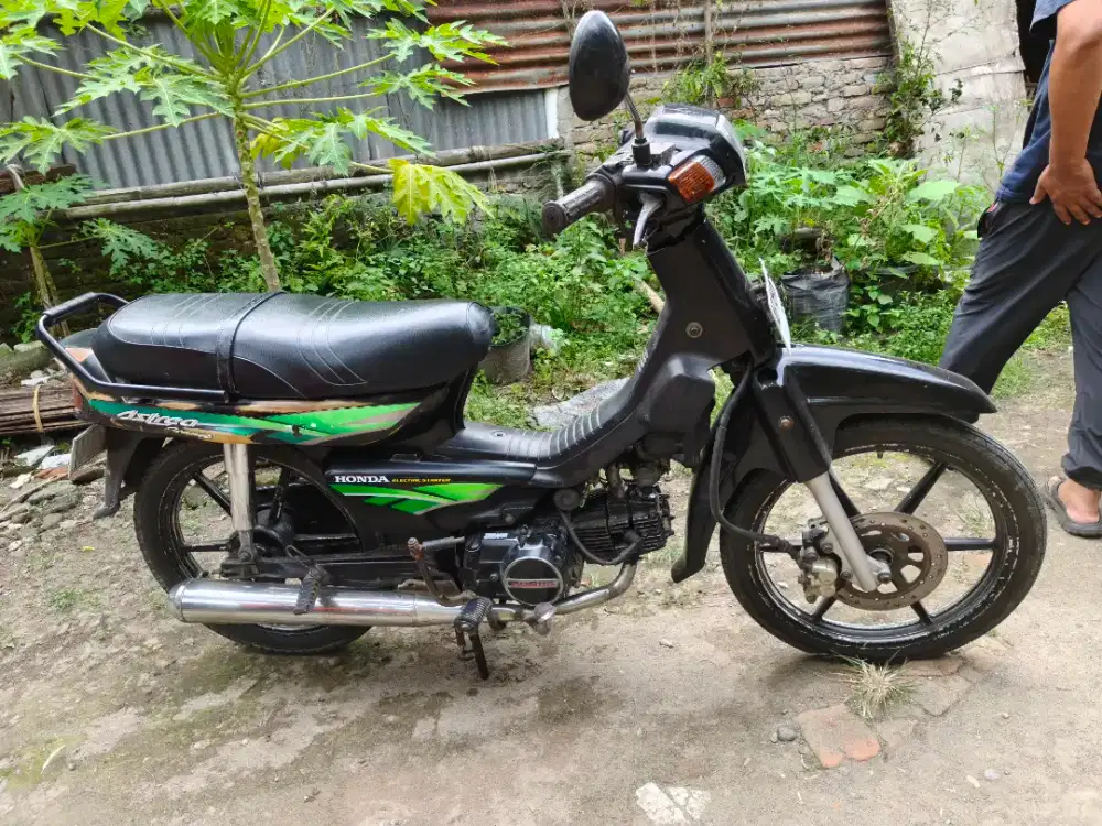 Astrea grand thn 1994 plat AB Bantul