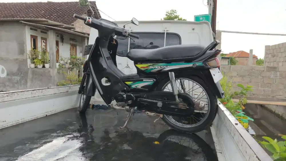 Astrea grand impressa THN 1998 plat AB kota