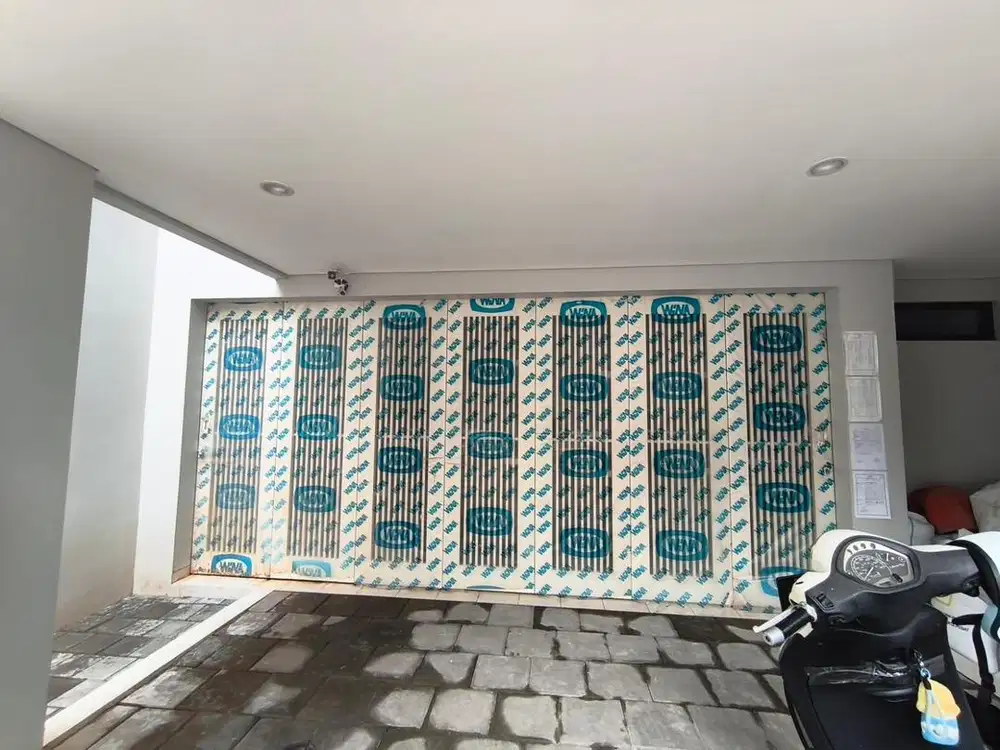 Pintu garasi merk wina