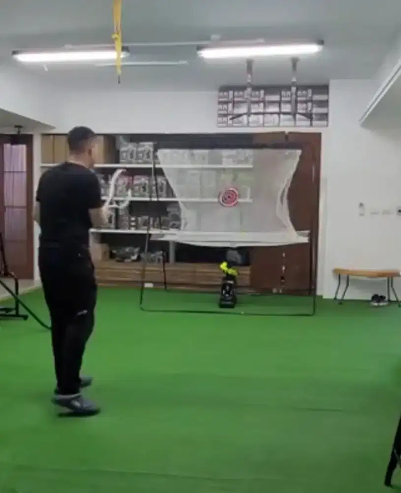 Mesin pelontar bola tenis auto swing dan net training