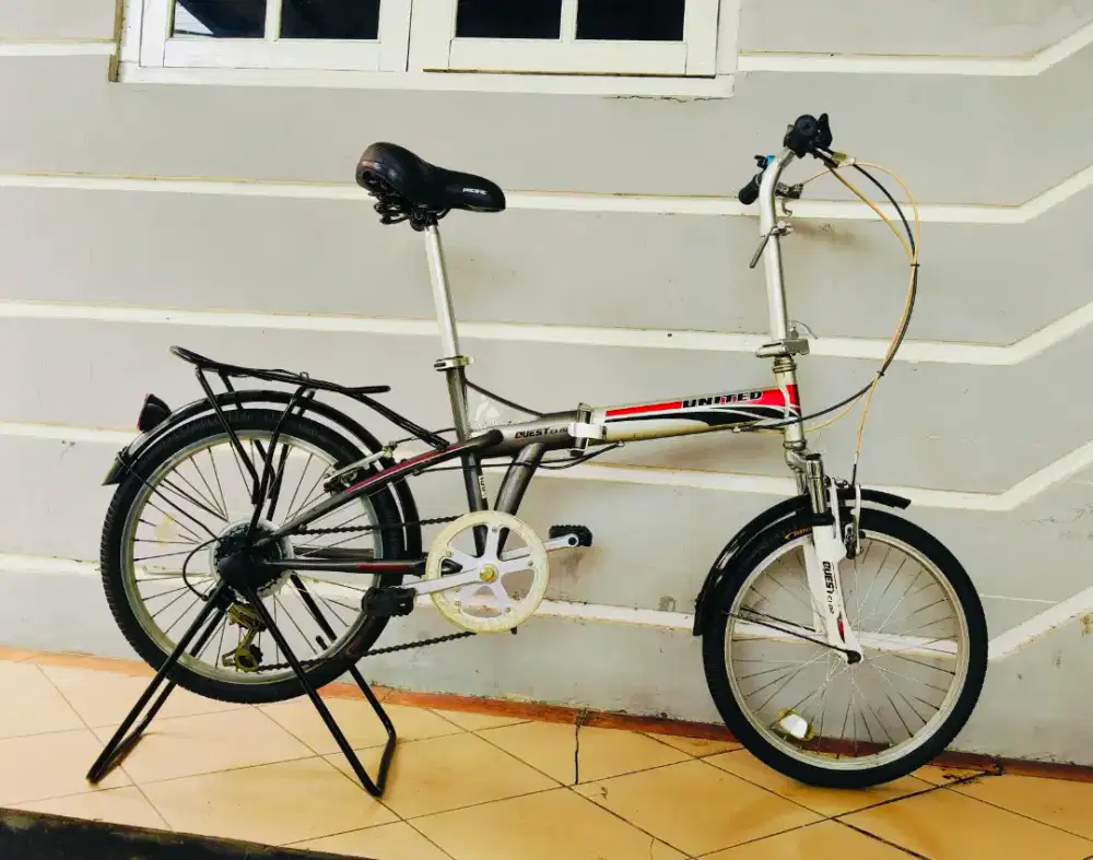 Sepeda lipat merek united uk'20 hrg 650rb net kondisi masih bagus