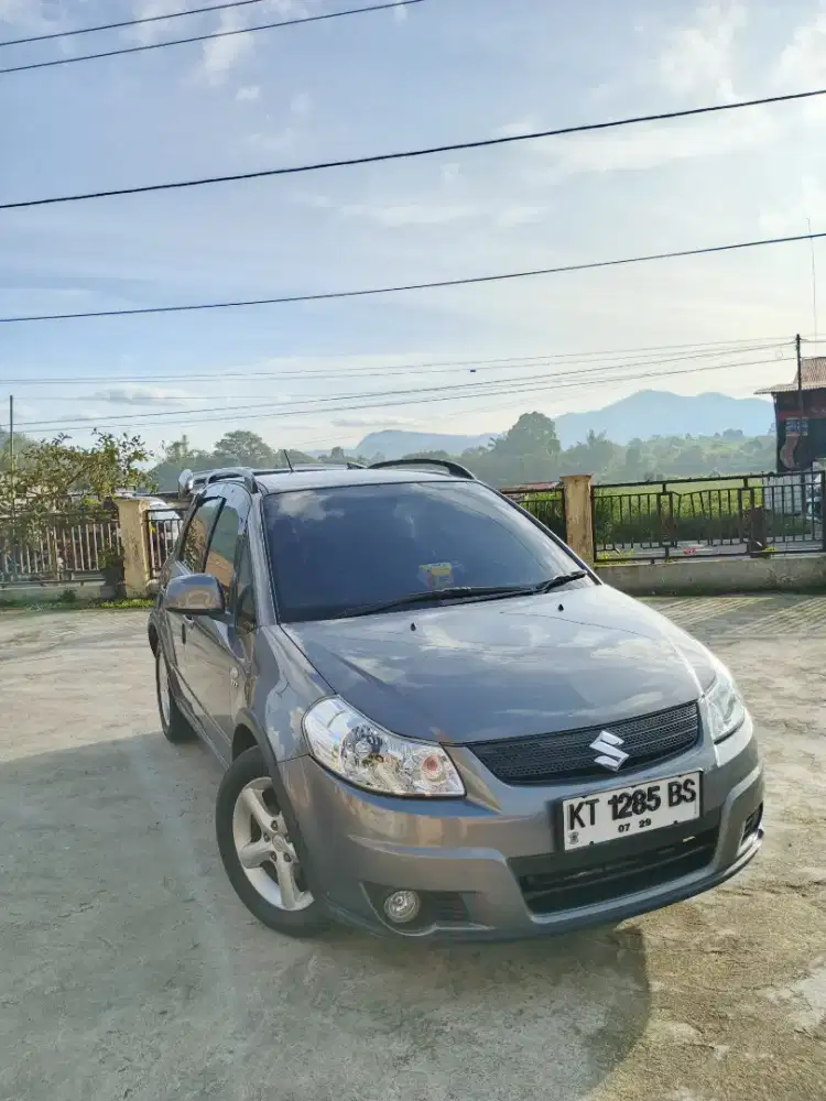 Suzuki SX4-X Over 1.5 MT Bensin Abu-Abu Metalik