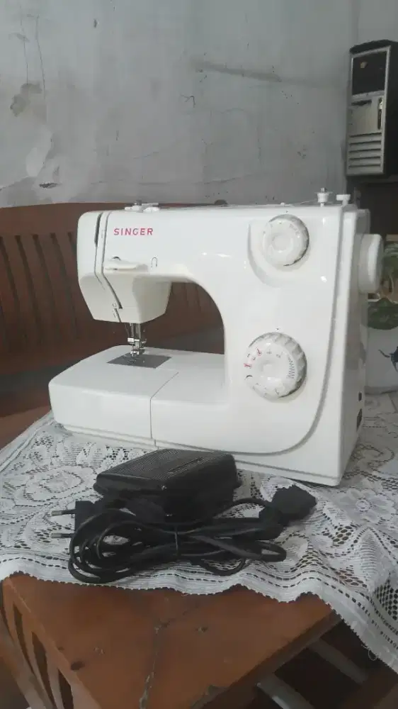 Mesin jahit merek singer