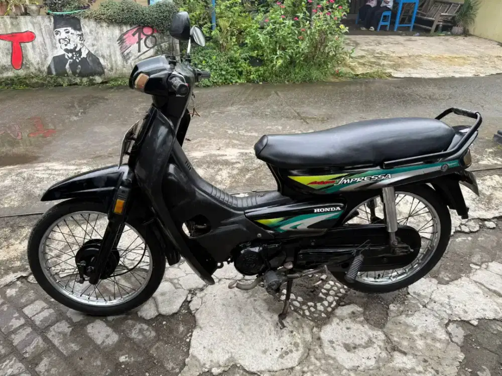 Astrea grand impressa THN 1998 plat AB kota