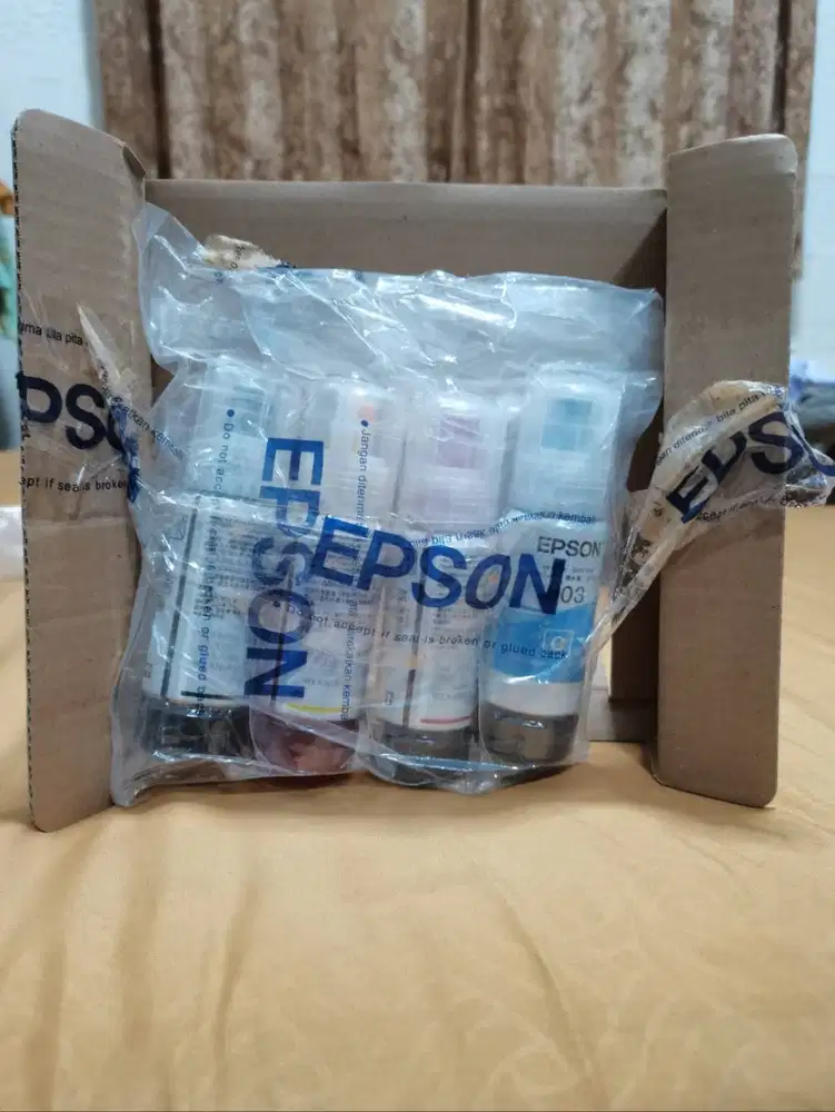 Tinta Epson 003 original Bawaan