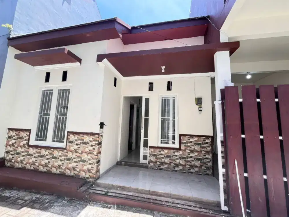 Rumah tengah kota lingkungan tenang