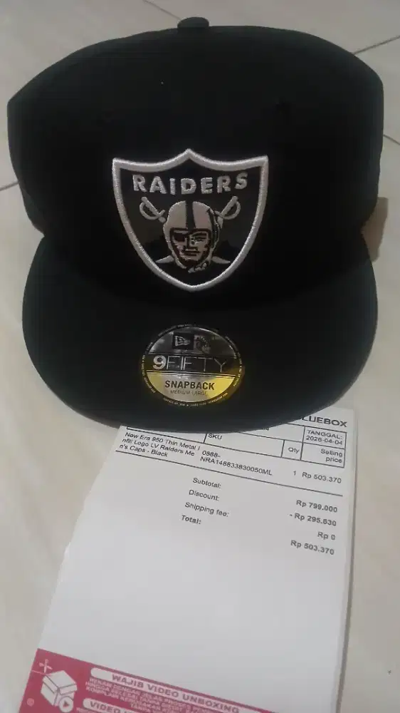 Topi new era baru