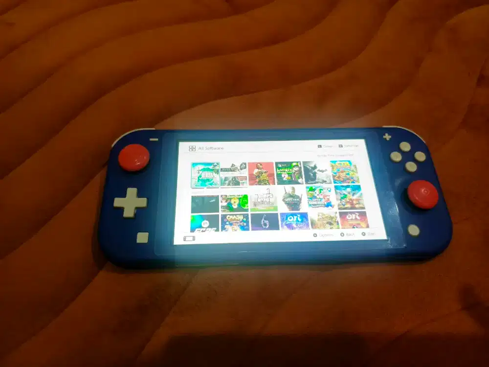 jual/tt Nintendo switch lite 256gb full games lengkap mulus siap pake