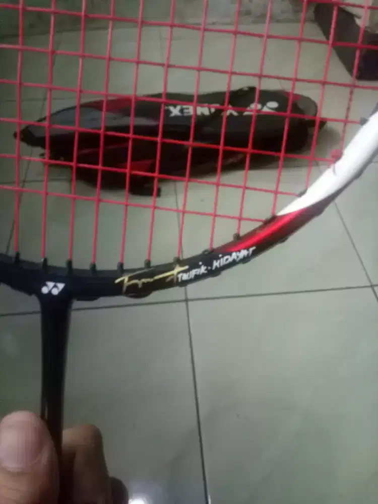 Raket tenis arc saber red taufik hidayat
