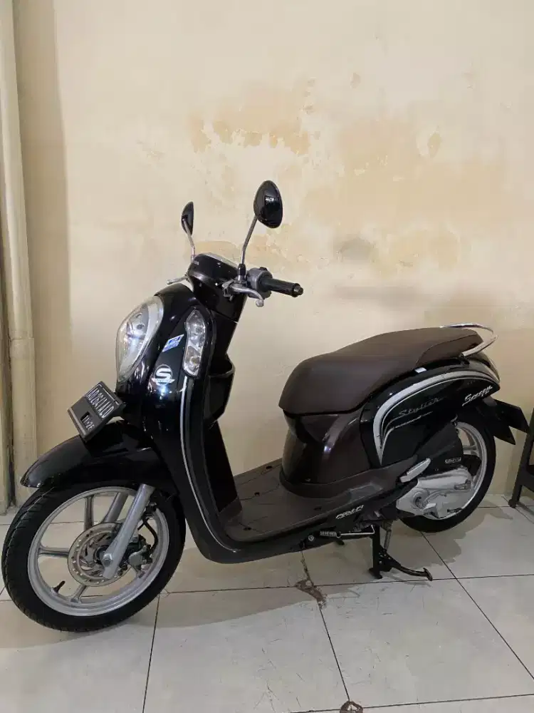 Scoopy f11 2016