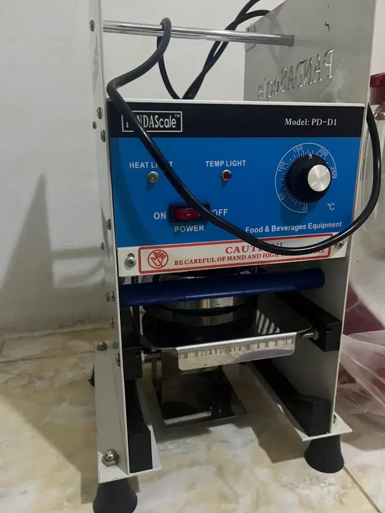 Mesin cup sealer perekat tutup gelas