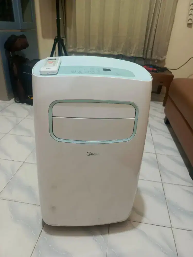 ac portabel merk midea 1 pk kondisi normal smua ok aman mantap